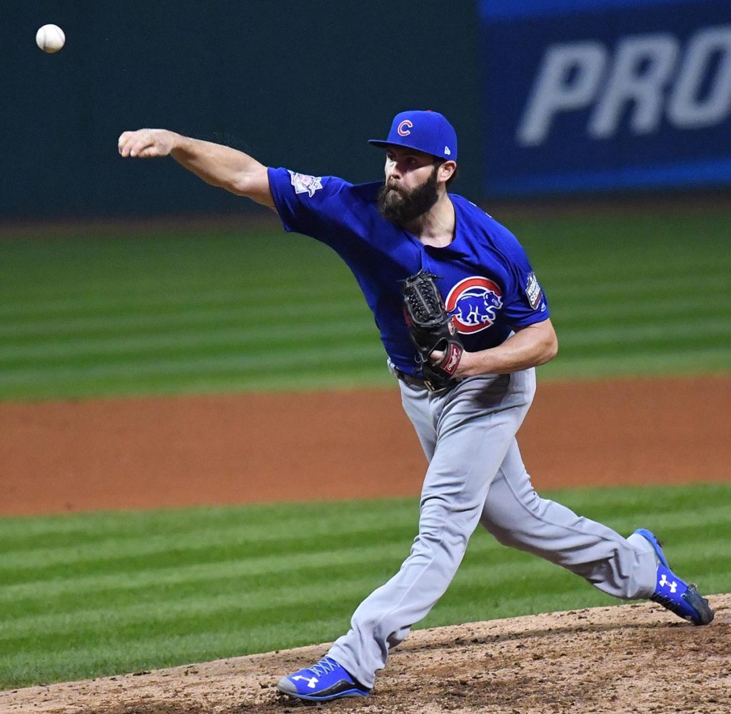 Chicago Cubs starting pitcher JAKE ARRIETA throws a strike Gold Medal