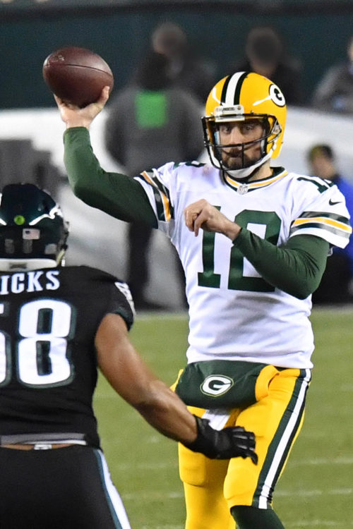 Green Bay Packers quarterback AARON RODGERS completes pass