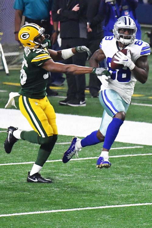 Dallas Cowboys wide receiver DEZ BRYANT receives a touchdown pass