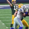Green Bay Packers quarterback AARON ROGERS completes pass