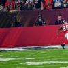 Atlanta Falcons Tevin Coleman outruns New England Patriots linebacker Rob Ninkovich for a touchdown.