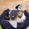 Yankees catcher Austin Romine high fives after hitting a home run