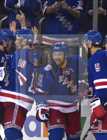 New York Rangers Derek Stephan celebrates with his teammates