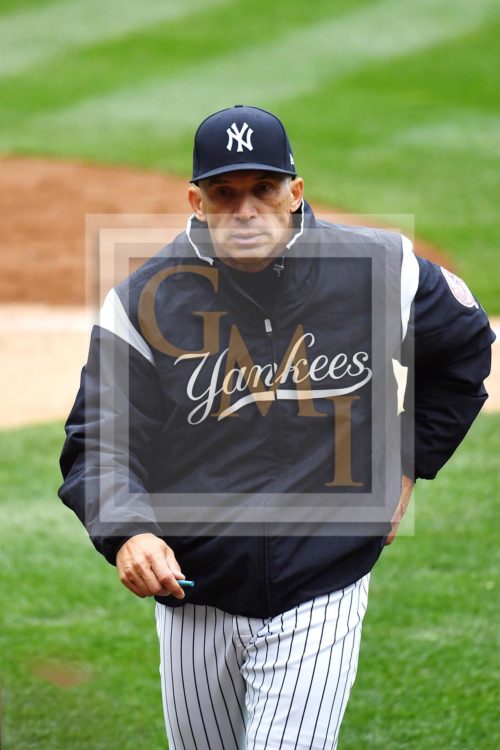 New York Yankees manager Joe Girardi walks to the dugout