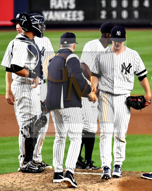Yankees manager Joe Girardi takes the ball from Yankees starting pitcher Sonny Gray