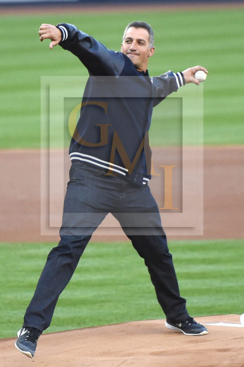 Retired Yankee and Astro pitcher ANDY PETTITTE throws out the ceremonial first pitch
