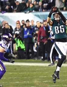 Philadelphia Eagles tight end ZACH ERTZ leaps in the air to catch a first down