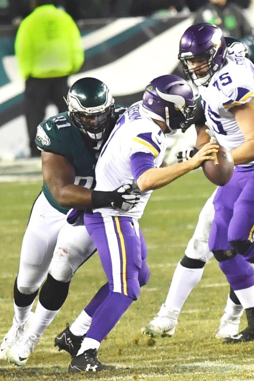 Philadelphia Eagles defensive tackle FLETCHER COX sacks Minnesota Vikings quarterback CASE KEENUM