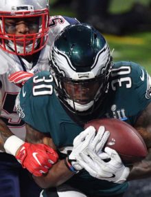 agles running back COREY CLEMENT scores a touchdown in the third quarter
