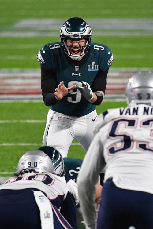 Eagles quarterback NICK FOLES barks out the signals in the third quarter
