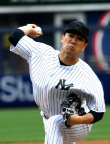 Yankees starting pitcher Masahiro Tanaka throws a strike