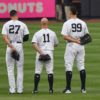 Yankees outfielders stand tall