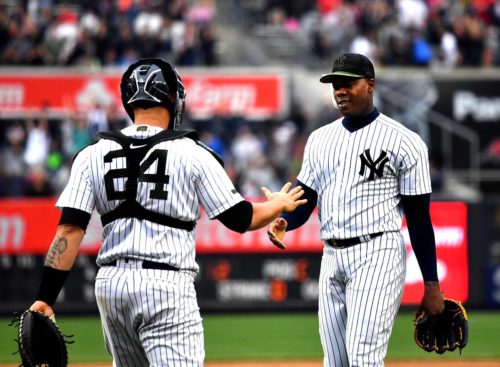 Yankees catcher Gary Sanchez congratulates Aroldis Chapman