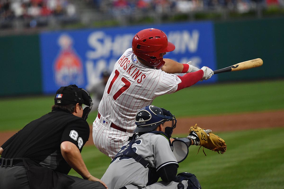 Phillies left fielder Rhys Hoskins hits a three run home run Gold