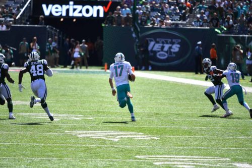 Dolphins quarterback RYAN TANNEHILL gains 20 yards on a quarterback keeper play