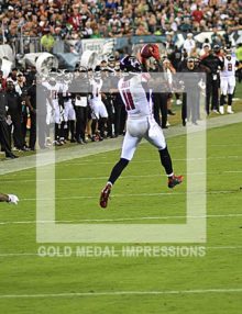 Atlanta Falcons wide receiver Julio Jones leaps into the air to receive a pass