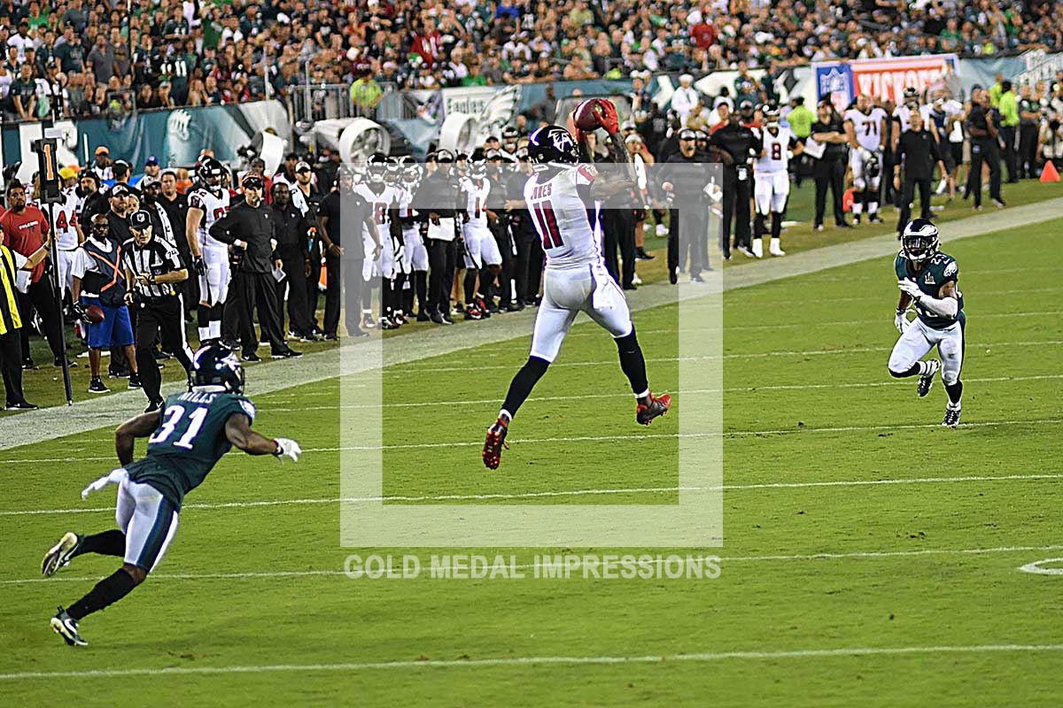 Atlanta Falcons wide receiver Julio Jones leaps into the air to receive a pass
