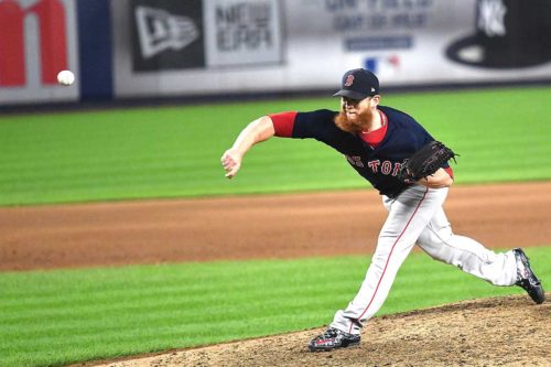 Boston Red Sox closer Craig Kimbrel strikes out New York Yankees designated hitter Giancarlo Stanton