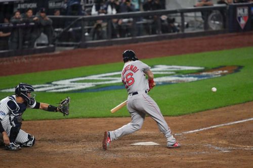 Boston Red Sox ANDREW BENINTENDI hits a 3-run double
