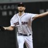 Boston Red Sox starter Chris Sale throws the first pitch of game one of the World Series