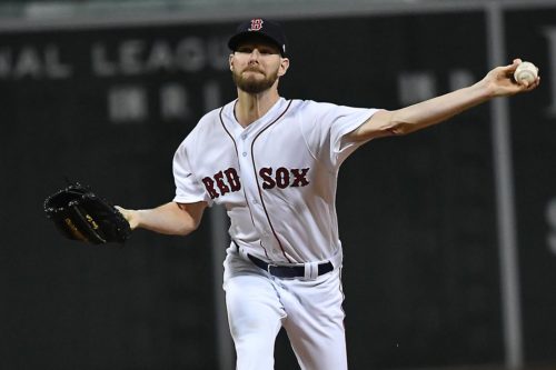 Boston Red Sox starter Chris Sale throws the first pitch of game one of the World Series