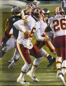 Redskins quarterback Mark Sanchez hands off to Adrian Peterson who runs for a 90 yard touchdown