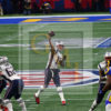 Tom Brady throwing a pass at Super Bowl LIII