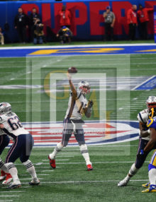 Tom Brady throwing a pass at Super Bowl LIII