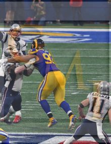 New England Patriots quarterback Tom Brady completes a pass to his wide receiver Julian Edelman