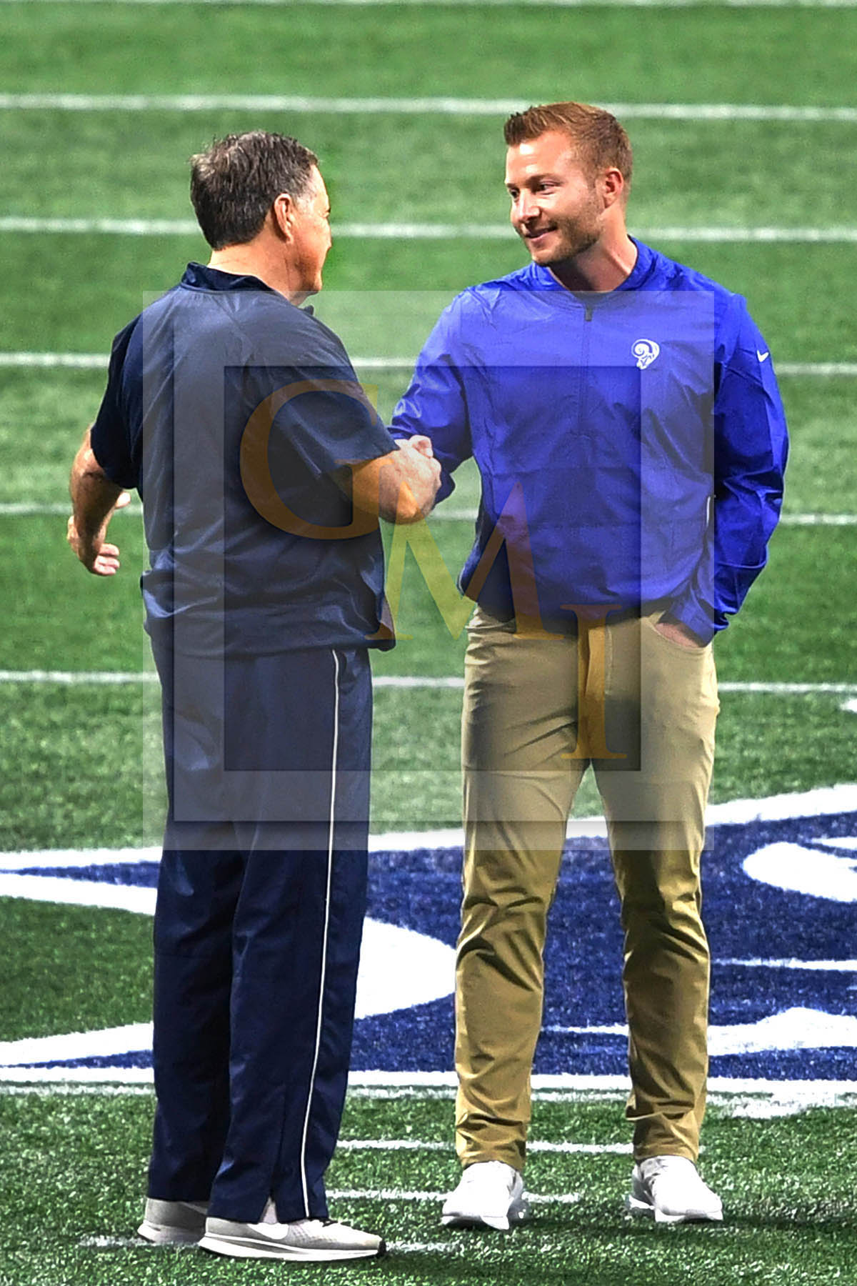 The youngest Super Bowl head coach Sean McVay of the Los Angeles Rams  shakes hands with the oldest head Coach Bill Belichick - Gold Medal  Impressions