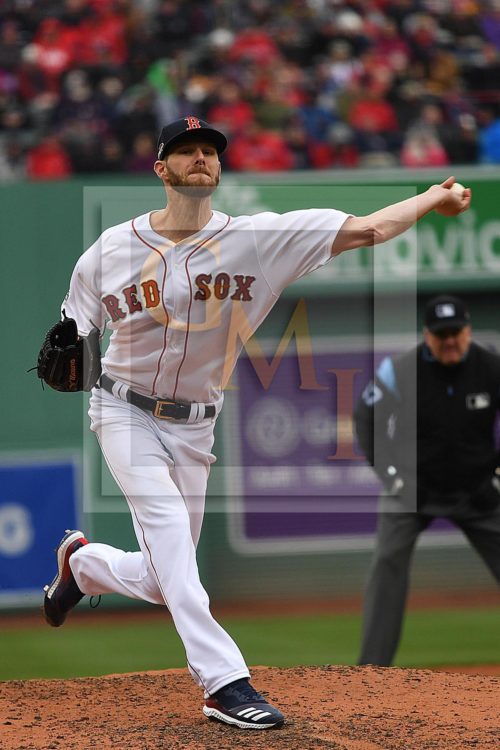 Boston Red Sox starting pitcher Chris Sale gives up a leadoff single