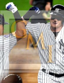 New York Yankees designated hitter Clint Frazier celebrates hitting a home run