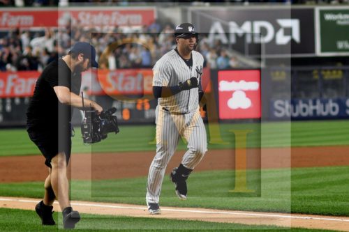 Yankees catcher Gary Sanchez rounds third base after hitting a tie-breaking home run