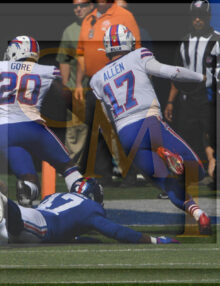 Buffalo Bills quarterback Josh Allen scampers into the end-zone on a 6 yard run