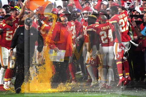 Kansas City Chiefs head coach Andy Reid gets soaked
