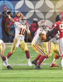 49ers quarterback Jimmy Garoppolo throws a pass to wide receiver Kendrick Bourne