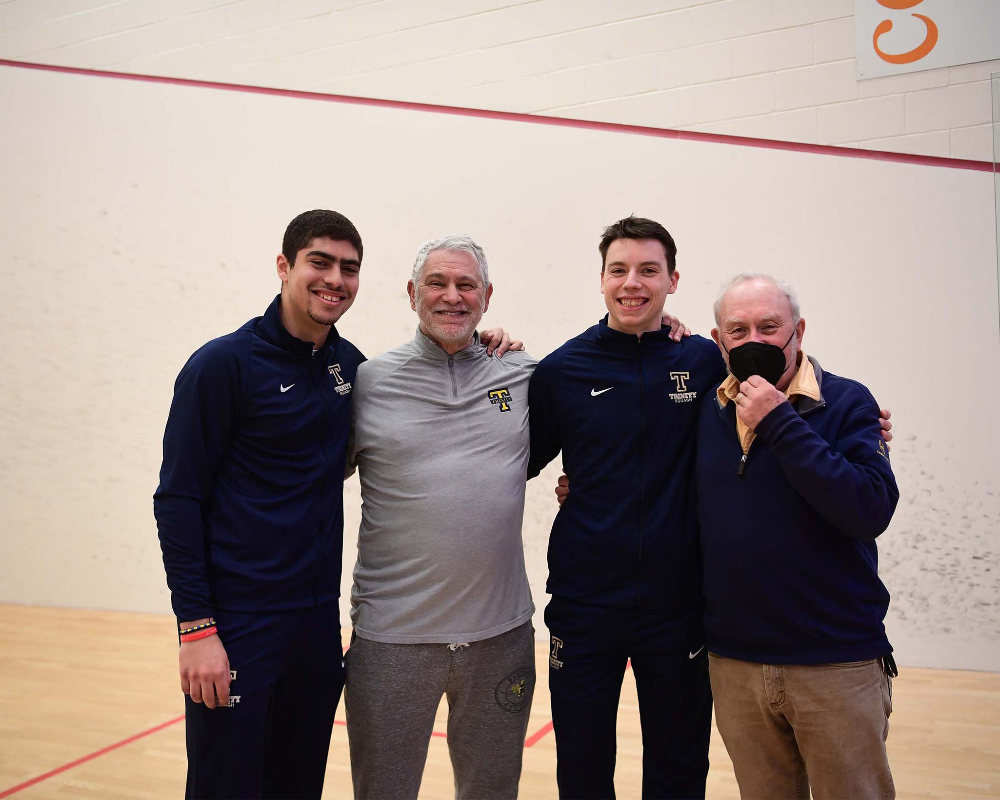 Trinity College's Paul Assaiante with coaches and Mohamad Sharaf